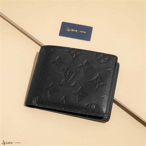 lv black embossed wallet|louis vuitton black monogram wallet.